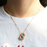 Initial necklace in bubble letters