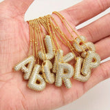 Initial necklace in bubble letters