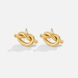 Margaux – Gold earrings with a braided shape.
