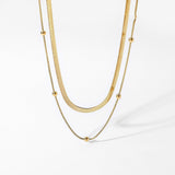Claire – A simple two-row gold necklace with a modern shine