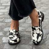 Claria | Cow Print Penny Loafers