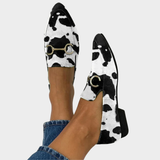 Novie | Cow Print Buckle Flats