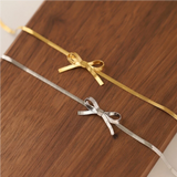 Rébecca – Gold necklace with initial-shaped pendant