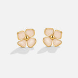 Élise – Round earrings with floral pattern.