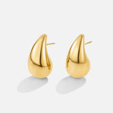 Anne – Gold hoop earrings with a delicate curve